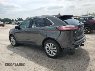 2020 Ford Edge Titanium с VIN 2FMPK4K97LBA11619, выставлен на аукционе Copart как лот 59505825 с пробегом 87 506 миль миль и Списание • Salvage title. История ставок и продаж доступна на DreamBid. Изображение 2.