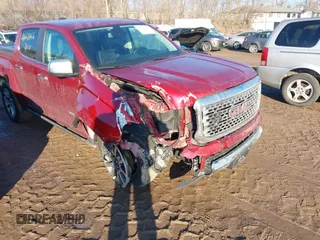 2019 GMC Canyon 4WD Denali with VIN 1GTG6EEN1K1123933, listed as a IAAI auction lot 41663466 with 69,654 mi miles. Bid and sale history available at carsss.com. Image 6.