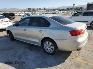 2011 Volkswagen Jetta SE with VIN 3VWDZ7AJXBM326103, listed as a Copart auction lot 57885185 with 149,064 mi miles and Salvage title. Bid and sale history available at DreamBid. Image 2.