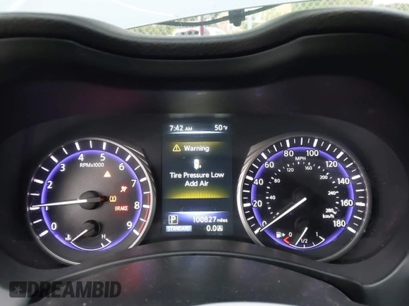 2015 Infiniti Q50 Premium with VIN JN1BV7AP1FM355875, listed as a IAAI auction lot 41777679 with 100,827 mi miles. Bid and sale history available at carsss.com. Image 7.
