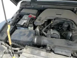 2018 Jeep Wrangler Sport with VIN 1C4GJXAG5JW303631, listed as a Copart auction lot 69999165 with 106,170 mi miles and Salvage title. Bid and sale history available at DreamBid. Image 14.