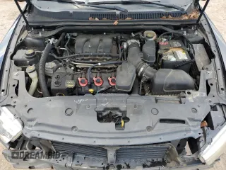 2013 Ford Taurus Limited with VIN 1FAHP2F84DG136769, listed as a Copart auction lot 60990765 with 228,994 mi miles and Salvage title. Bid and sale history available at DreamBid. Image 11.