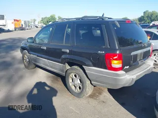 1999 Jeep Grand Cherokee Laredo with VIN 1J4GW58S0XC538913, listed as a IAAI auction lot 42684467 with 241,252 mi miles and . Bid and sale history available at DreamBid. Image 3.