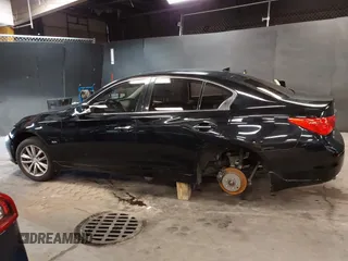 2017 Infiniti Q50 Premium z VIN JN1EV7AR7HM834870, wystawiony jako IAAI lot #42381151 z przebiegiem 89 438 mil mil oraz . Historia ofert i sprzedaży dostępna na DreamBid. Obrazek 14.