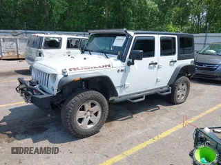 2015 Jeep Wrangler Unlimited Rubicon z VIN 1C4BJWFGXFL755810, wystawiony jako IAAI lot #42495531 z przebiegiem 109 668 mil mil oraz . Historia ofert i sprzedaży dostępna na DreamBid. Obrazek 2.