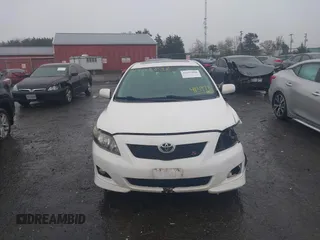 2010 Toyota Corolla with VIN 2T1BU4EEXAC413978, listed as a IAAI auction lot 41953898 with 121,676 mi miles. Bid and sale history available at carsss.com. Image 13.