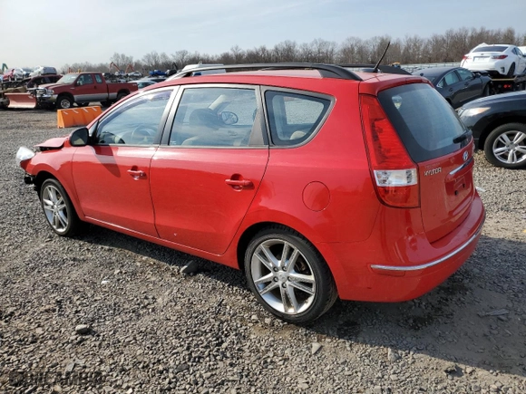 2010 Hyundai Elantra Touring SE with VIN KMHDC8AE3AU066338, listed as a Copart auction lot 48670945 with 124,348 mi miles and Salvage Title. Bid and sale history available at carsss.com. Image 2.
