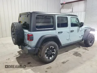 2024 Jeep Wrangler Rubicon with VIN 1C4RJXR67RW293197, listed as a Copart auction lot 59886995 with Not provided miles and Salvage title. Bid and sale history available at DreamBid. Image 3.
