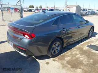 2021 Kia K5 LXS with VIN 5XXG14J2XMG001342, listed as a IAAI auction lot 41329068 with 53,778 mi miles. Bid and sale history available at carsss.com. Image 4.