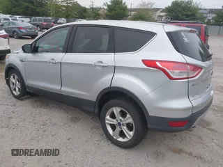 2015 Ford Escape SE z VIN 1FMCU0G73FUB10414, wystawiony jako IAAI lot #42173063 z przebiegiem 120 200 mil mil oraz . Historia ofert i sprzedaży dostępna na DreamBid. Obrazek 3.