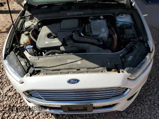 2013 Ford Fusion Titanium Hybrid z VIN 3FA6P0RUXDR376633, wystawiony jako Copart lot #57685555 z przebiegiem 133 248 mil mil oraz Szkoda całkowita • Salvage title. Historia ofert i sprzedaży dostępna na DreamBid. Obrazek 11.