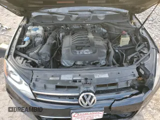 2012 Volkswagen Touareg Sport z VIN WVGEF9BP7CD006020, wystawiony jako Copart lot #88211145 z przebiegiem 180 729 mil mil oraz Szkoda całkowita • Salvage title. Historia ofert i sprzedaży dostępna na DreamBid. Obrazek 12.