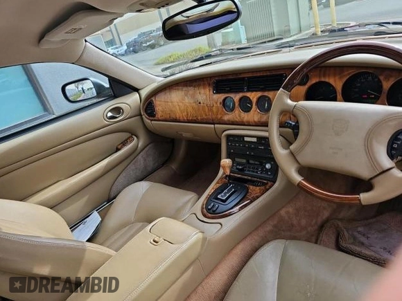1997 Jaguar XK with VIN SAJGX5747VC007213, listed as a Copart auction lot 45953175 with 82,461 mi miles and Clean Title. Bid and sale history available at DreamBid. Image 5.