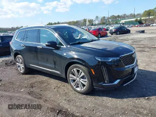 2023 Cadillac XT6 AWD Premium Luxury with VIN 1GYKPDRS8PZ153838, listed as a IAAI auction lot 41838527 with 60,034 mi miles and . Bid and sale history available at DreamBid. Image 1.
