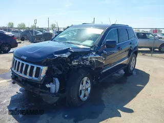 2012 Jeep Grand Cherokee Laredo with VIN 1C4RJFAG0CC160255, listed as a IAAI auction lot 41967809 with 127,702 mi miles. Bid and sale history available at carsss.com. Image 18.