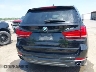 2015 BMW X5 sDrive35i with VIN 5UXKR2C50F0H39042, listed as a IAAI auction lot 42027819 with 152,239 mi miles. Bid and sale history available at carsss.com. Image 16.