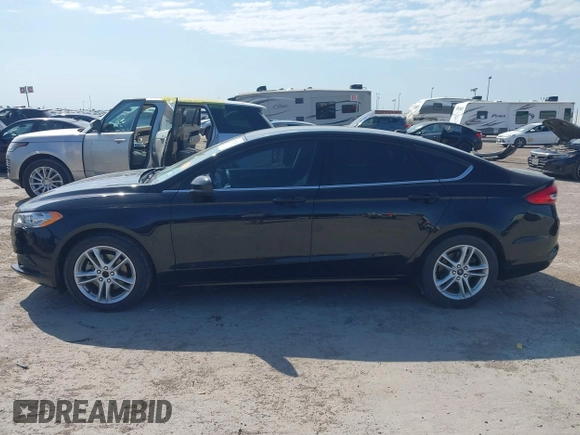 2018 Ford Fusion SE z VIN 3FA6P0H74JR125761, wystawiony jako IAAI lot #41992708 z przebiegiem 102 242 mil mil oraz . Historia ofert i sprzedaży dostępna na DreamBid. Obrazek 14.