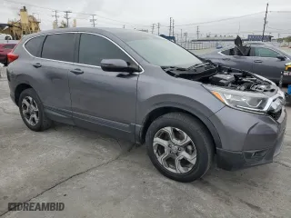 2019 Honda CR-V EX-L with VIN JHLRW2H84KX011642, listed as a Copart auction lot 86776954 with 70,969 mi miles and Salvage Title. Bid and sale history available at carsss.com. Image 4.