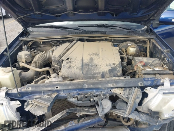 2015 Toyota Tacoma with VIN 3TMMU4FN0FM077148, listed as a IAAI auction lot 41274934 with 112,617 mi miles and . Bid and sale history available at DreamBid. Image 10.