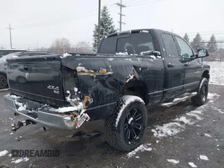 2006 Dodge 1500 SLT with VIN 1D7HU18256J142677, listed as a IAAI auction lot 41159900 with 236,662 mi miles. Bid and sale history available at carsss.com. Image 4.