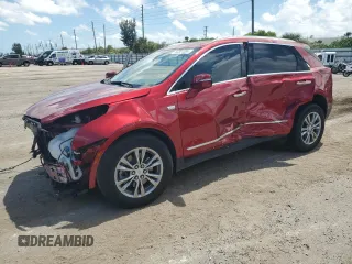 2022 Cadillac XT5 FWD Premium Luxury z VIN 1GYKNCRS7NZ158008, wystawiony jako Copart lot #63301304 z przebiegiem Nie podano mil oraz Nie do naprawy • Non repairable. Historia ofert i sprzedaży dostępna na DreamBid. Obrazek 1.