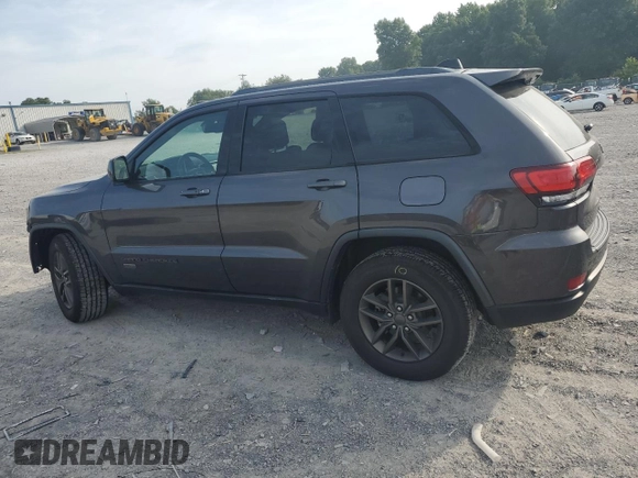 2016 Jeep Grand Cherokee 75th Anniversary with VIN 1C4RJEAG1GC506443, listed as a Copart auction lot 59874015 with 135,714 mi miles and Salvage title. Bid and sale history available at DreamBid. Image 2.