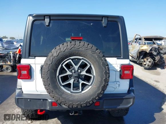 2024 Jeep Wrangler Rubicon with VIN 1C4PJXFG6RW291185, listed as a IAAI auction lot 41773050 with 12,400 mi miles and . Bid and sale history available at DreamBid. Image 16.