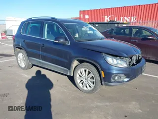 2016 Volkswagen Tiguan SE z VIN WVGBV7AX5GW609540, wystawiony jako IAAI lot #41369373 z przebiegiem 90 272 mil mil oraz . Historia ofert i sprzedaży dostępna na DreamBid. Obrazek 1.