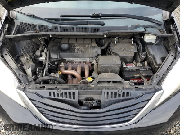 2012 Toyota Sienna with VIN 5TDKA3DC0CS014719, listed as a Copart auction lot 88358865 with 118,901 mi miles and Salvage Title. Bid and sale history available at DreamBid. Image 14.