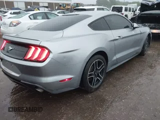 2020 Ford Mustang EcoBoost with VIN 1FA6P8TH3L5111659, listed as a IAAI auction lot 42115879 with 93,928 mi miles and . Bid and sale history available at DreamBid. Image 4.