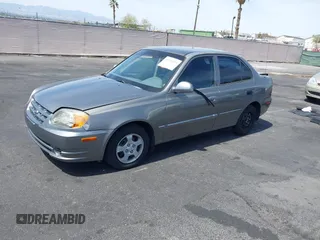 2003 Hyundai Accent GL with VIN KMHCG45C73U471607, listed as a IAAI auction lot 41956551 with 222,305 mi miles. Bid and sale history available at carsss.com. Image 12.