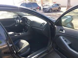 2015 Kia Optima SX with VIN 5XXGR4A72FG366833, listed as a IAAI auction lot 41726219 with 144,664 mi miles and . Bid and sale history available at carsss.com. Image 5.
