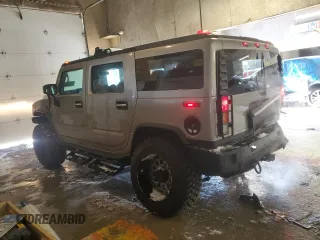 2004 Hummer H2 with VIN 5GRGN23U34H104465, listed as a Copart auction lot 41432055 with 154,346 mi miles and Salvage Title. Bid and sale history available at carsss.com. Image 2.