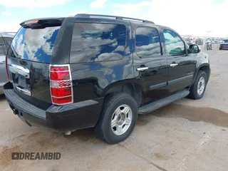 2007 Chevrolet Tahoe LS with VIN 1GNFC13C47J406467, listed as a IAAI auction lot 42081860 with 275,814 mi miles and . Bid and sale history available at DreamBid. Image 4.