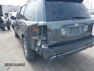 2008 Honda Pilot SE z VIN 5FNYF28398B002984, wystawiony jako IAAI lot #42105823 z przebiegiem 173 590 mil mil oraz . Historia ofert i sprzedaży dostępna na DreamBid. Obrazek 3.