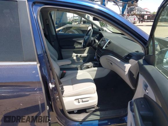 2020 Honda Ridgeline RTL with VIN 5FPYK3F56LB028917, listed as a IAAI auction lot 42280770 with 17,598 mi miles and . Bid and sale history available at DreamBid. Image 5.
