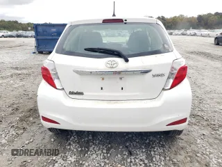 2012 Toyota Yaris L with VIN JTDKTUD30CD528470, listed as a Copart auction lot 79952414 with 157,062 mi miles and Salvage Title. Bid and sale history available at DreamBid. Image 6.