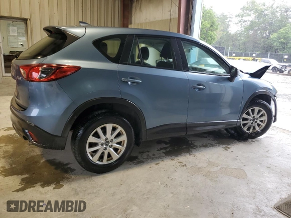 2016 Mazda CX-5 Sport z VIN JM3KE4BY0G0628372, wystawiony jako Copart lot #57534785 z przebiegiem 152 487 mil mil oraz Szkoda całkowita • Salvage title. Historia ofert i sprzedaży dostępna na DreamBid. Obrazek 3.