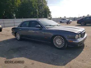 2004 Jaguar XJ with VIN SAJWA71CX4SG32785, listed as a Copart auction lot 69792134 with 183,705 mi miles and Non Repairable. Bid and sale history available at carsss.com. Image 4.