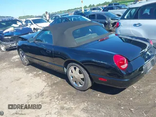 2002 Ford Thunderbird w/Hardtop Premium with VIN 1FAHP60AX2Y116200, listed as a IAAI auction lot 40129557 with 88,991 mi miles. Bid and sale history available at carsss.com. Image 3.
