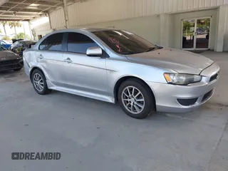 2014 Mitsubishi Lancer ES z VIN JA32U2FUXEU009094, wystawiony jako IAAI lot #42445395 z przebiegiem 190 918 mil mil oraz . Historia ofert i sprzedaży dostępna na DreamBid. Obrazek 1.
