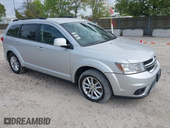 2014 Dodge Journey SXT with VIN 3C4PDCBG9ET209357, listed as a IAAI auction lot 42257467 with 121,786 mi miles and . Bid and sale history available at DreamBid. Image 1.