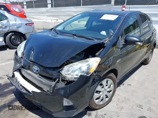 2012 Toyota Prius One z VIN JTDKDTB33C1017704, wystawiony jako IAAI lot #42227623 z przebiegiem 116 058 mil mil oraz . Historia ofert i sprzedaży dostępna na DreamBid. Obrazek 6.