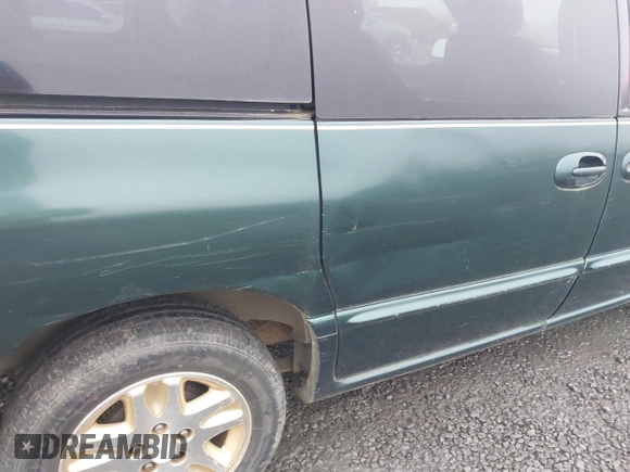 1996 Dodge Caravan z VIN 1B4GP55L7TB313983, wystawiony jako IAAI lot #41343592 z przebiegiem 165 952 mil mil oraz . Historia ofert i sprzedaży dostępna na DreamBid. Obrazek 12.
