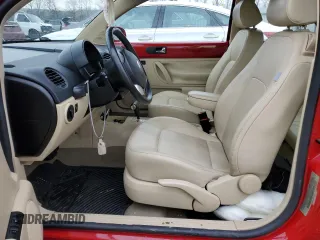 2009 Volkswagen New Beetle Coupe S with VIN 3VWPW31C79M502390, listed as a Copart auction lot 42453195 with 57,140 mi miles and Salvage Title. Bid and sale history available at carsss.com. Image 7.