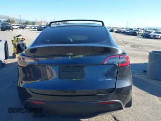 2024 Tesla Model Y Long Range with VIN 7SAYGAEE7RF126351, listed as a IAAI auction lot 41282973 with 5,919 mi miles. Bid and sale history available at carsss.com. Image 15.