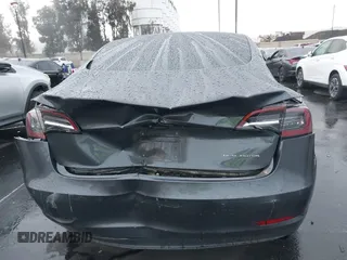 2018 Tesla Model 3 Long Range Battery with VIN 5YJ3E1EB1JF149423, listed as a IAAI auction lot 41896090 with 158,787 mi miles and . Bid and sale history available at DreamBid. Image 17.
