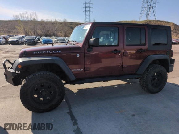 2010 Jeep Wrangler Unlimited Rubicon with VIN 1J4BA6H13AL140902, listed as a Copart auction lot 54335455 with 118,423 mi miles and Clean title. Bid and sale history available at DreamBid. Image 1.