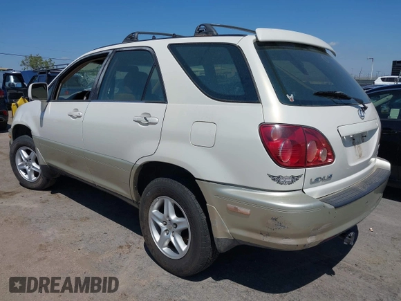 1999 Lexus RX 300 Luxury SUV with VIN JT6GF10U7X0026909, listed as a IAAI auction lot 42143068 with 203,686 mi miles. Bid and sale history available at carsss.com. Image 3.