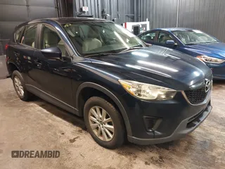2014 Mazda CX-5 Sport z VIN JM3KE2BE7E0428497, wystawiony jako IAAI lot #42221809 z przebiegiem 136 989 mil mil oraz . Historia ofert i sprzedaży dostępna na DreamBid. Obrazek 1.